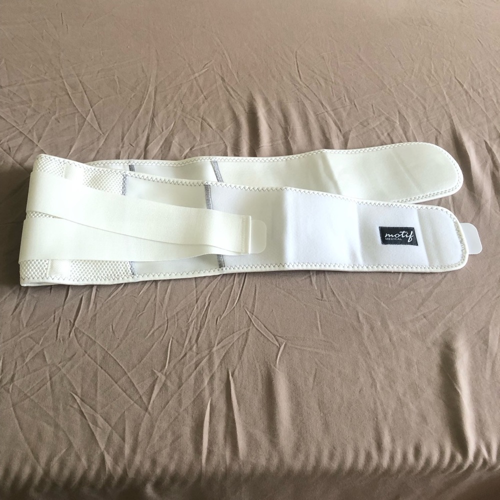 White pregnancy back brace band Motif Medical